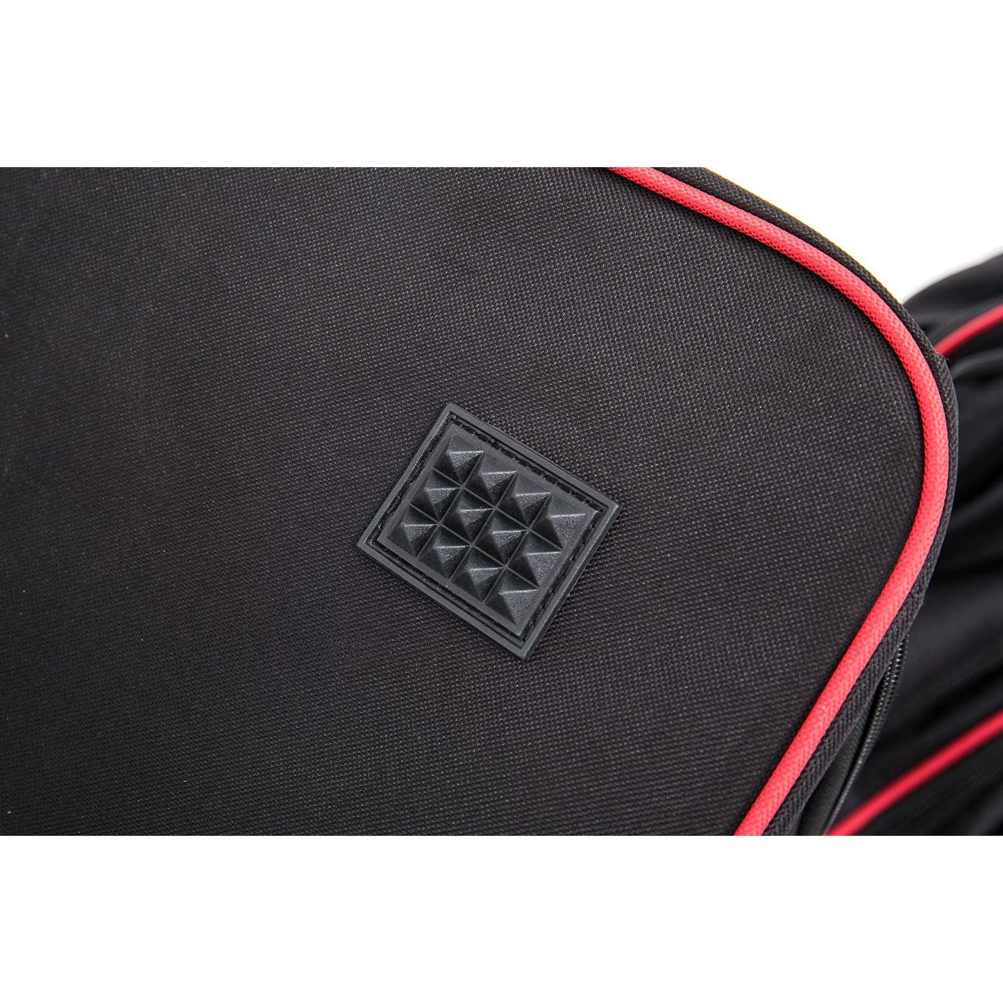Black bag with red trim and a geometric logo on a white background
