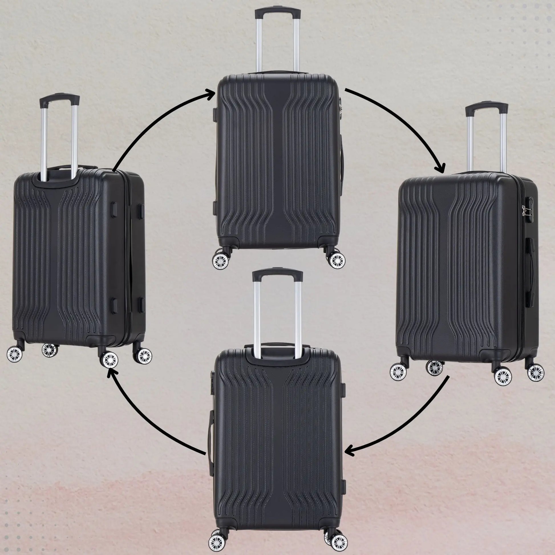 Four black suitcases with wheels on a beige background