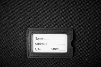 Large Suitcase address tag in DK 16 Orivo Black on white background