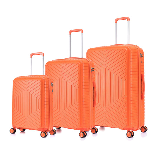 Set of three orange suitcases with a textured pattern on a white background